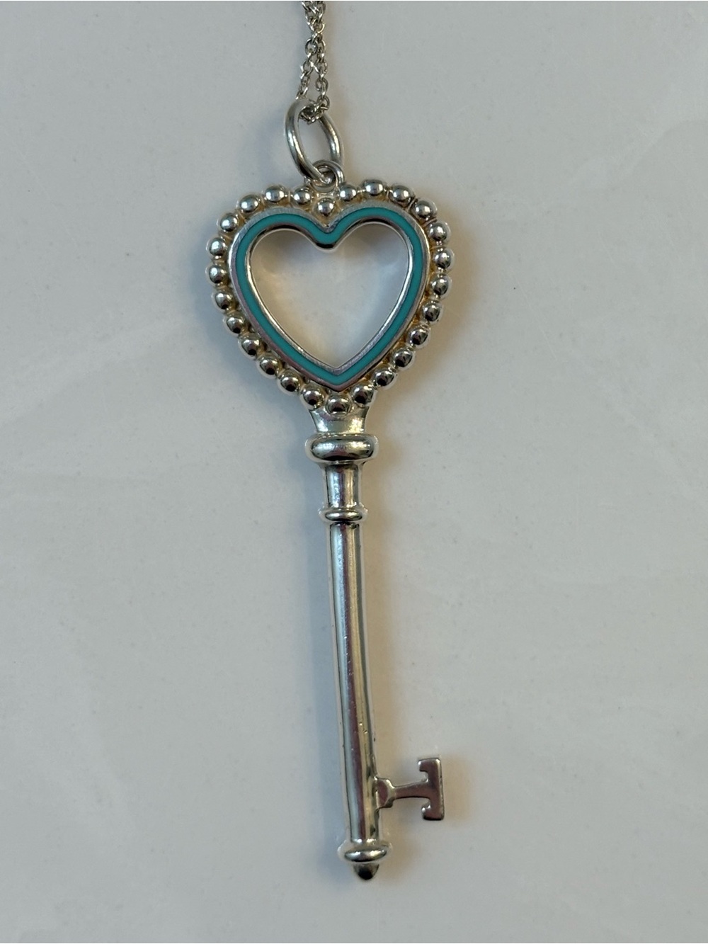 Tiffany & Co. enamel and sterling silver heart key pendant necklace with chain - Picture 7 of 9